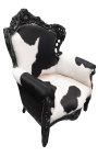 Grand fauteuil de style baroque en vrai peau de vache et bois laqué noir