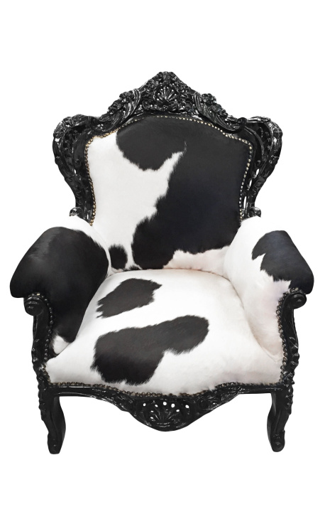 Grand fauteuil de style baroque en vrai peau de vache et bois laqué noir