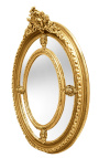 Grand miroir ovale doré baroque de style Louis XVI