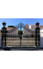 Gate for castle, baroque wrought iron gates with two doors two columns with lanterns top