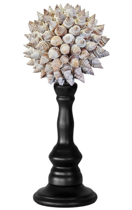Ball with gray shells on wooden baluster