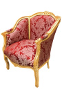 Grande bergère de style Louis XV satiné rouge aux motifs "Gobelins" et bois doré