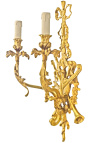 Grote bronzen wandlamp in Lodewijk XVI-stijl met muziekinstrumenten