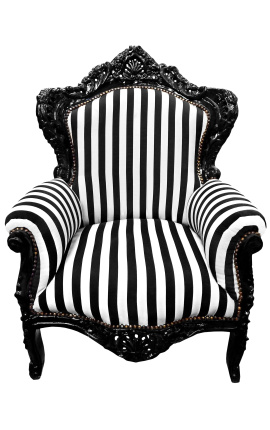 Velik fotelj v baročnem slogu s črno-belimi črtami in črnim lesom