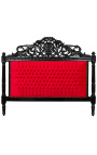 Baročna postelja z rdečim žametnim blagom in črno lakiranim lesom.