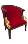 Grande bergère de style Empire velours bordeaux et bois acajou