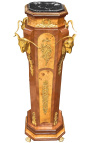Kolom in Napoleon III-stijl met rammen en gouden bronzen beelden
