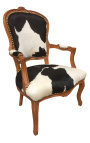 Baroque armchair of Louis XV style with real black and white cowhide and raw wood