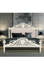 Baroque bed with beige velvet fabric and beige lacquered wood.
