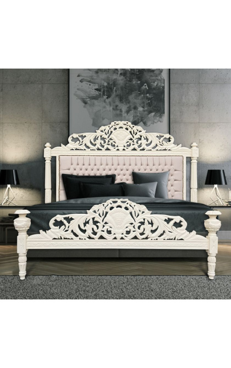 Baroque bed with beige velvet fabric and beige lacquered wood.