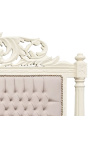 Barokinė lova su smėlio spalvos aksominiu audiniu ir smėlio spalvos lakuota mediena.