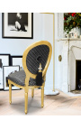 Cadeira estilo Luís XVI com pompom em tecido de bolinhas pretas e madeira dourada