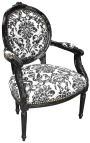 Fauteuil Louis XVI de style baroque tissu motifs floraux noir et bois noir