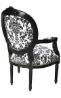 Fauteuil Louis XVI de style baroque tissu motifs floraux noir et bois noir