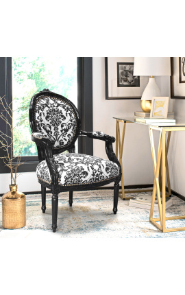 Fauteuil Louis XVI de style baroque tissu motifs floraux noir et bois noir
