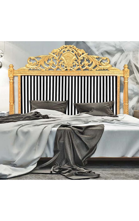 Barokk sengegavl med sort og hvit stripete stoff og forgylt tre
