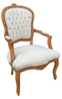 Armchair of Louis XV style beige velvet and natural wood color