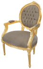 Barokowy fotel w stylu Ludwika XVI medalion ciemnoszary tkanina i złote drewno.
