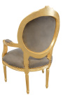 Barokowy fotel w stylu Ludwika XVI medalion ciemnoszary tkanina i złote drewno.