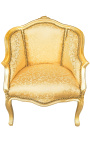 Bergère de style Louis XV tissu satiné doré et bois doré