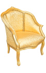 Bergère de style Louis XV tissu satiné doré et bois doré
