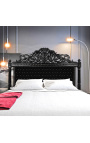 Barokkityylinen sängynpääty mustaa samettia strassilla ja mustalla lakatulla puulla.