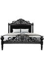 Baroková posteľ s čiernou zamatovou látkou s kamienkami a čiernym lakovaným drevom.
