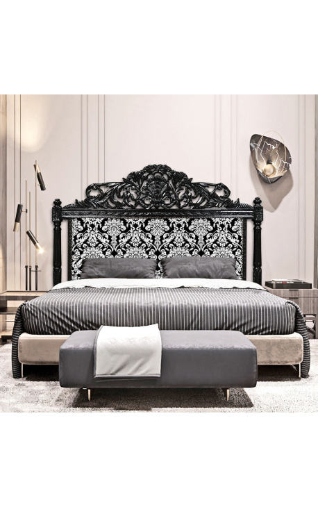 Baroque bed headboard with white floral pattern fabric and black wood