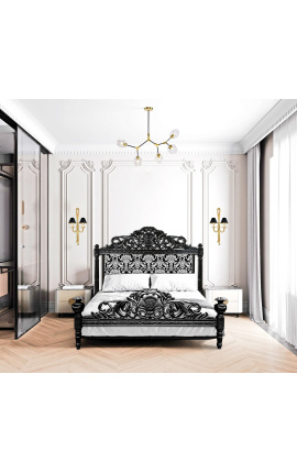 Barokní postel s látkou s bílým květinovým vzorem a lesklým černým dřevem
