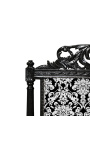Barok bed met witte stof met bloemmotief en glanzend zwart hout
