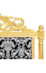 Cama barroca com tecido floral branco e madeira dourada