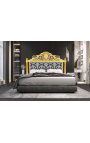 Baroque bed headboard with white floral pattern fabric and gold wood