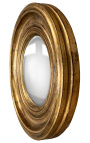 Round convex mirror called "witch's mirror" with patinated gold frame
