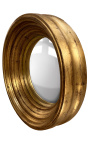 Large round convex mirror called "witch mirror" with patinated gold frame