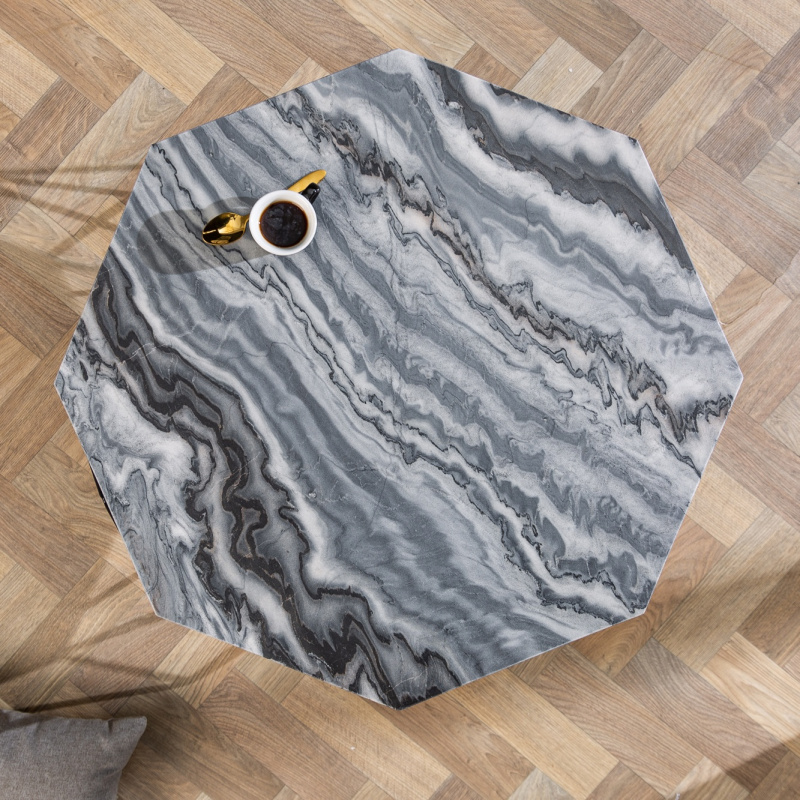 Octagonal "Diamo" coffee table with gray marble top and blackcolored metal