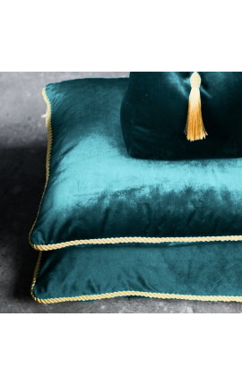 Square cushion in blue petrol color velvet with golden twirled trim 45 x 45