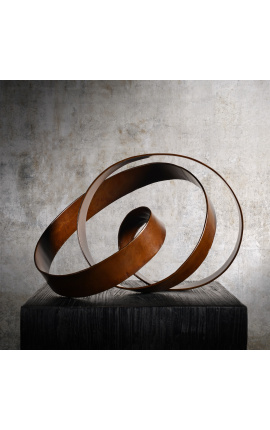 Escultura de cinta infinita de color bronze metàl·lic