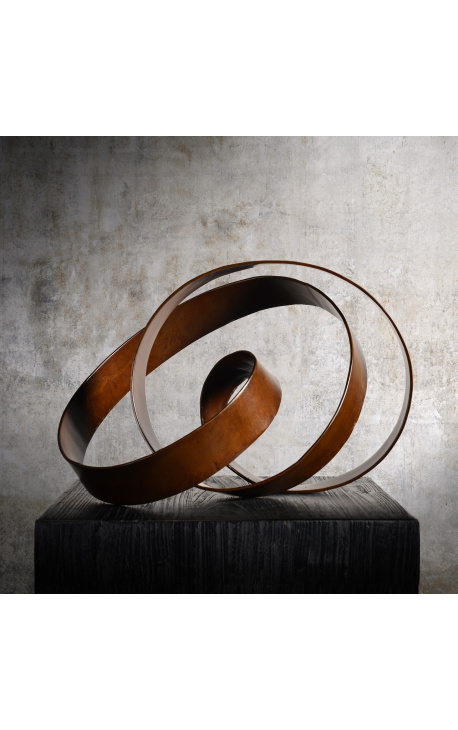 Infinity ribbon sculpture in bronze color in metal