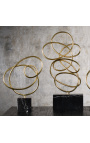 Set of 3 brass spirals on marble support