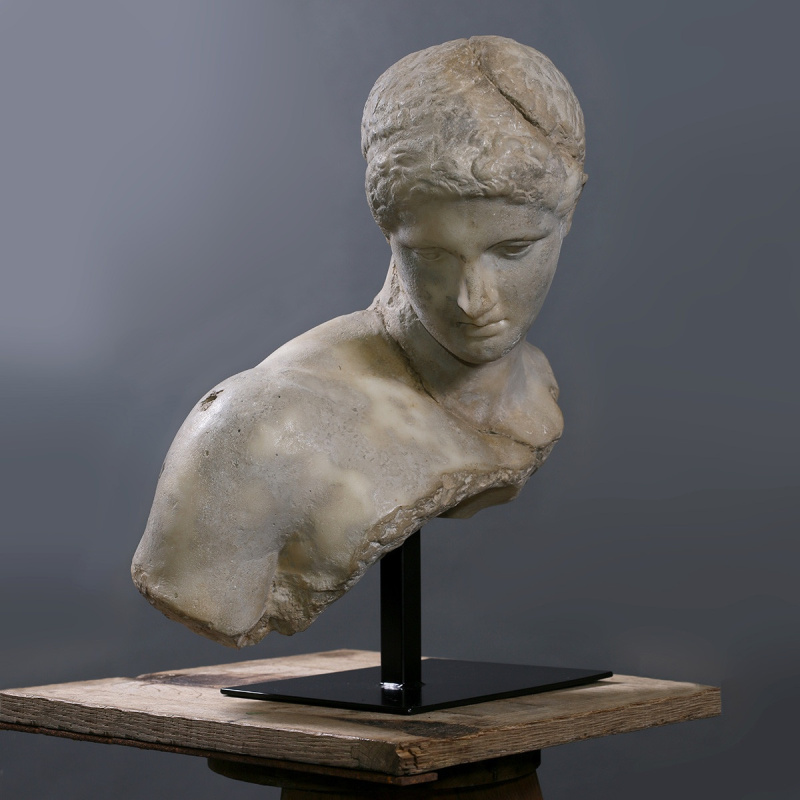 Large sculpture Bust of Discophore on black metal support