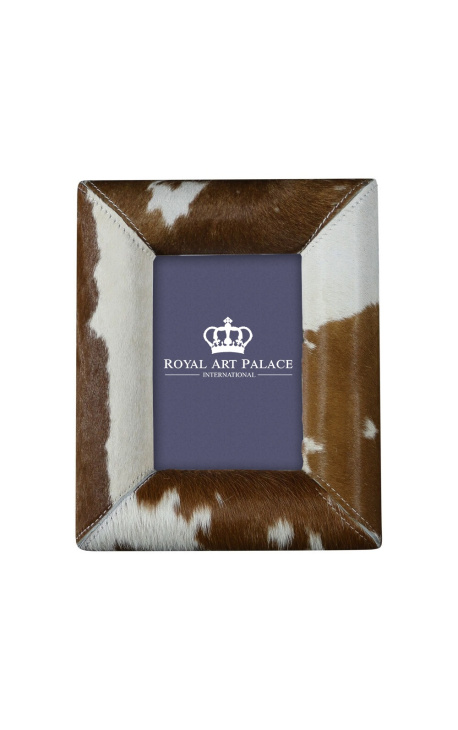 Rectangular photo frame in brown and white cowhide for a photo of 18cm x 13cm