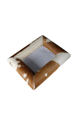 Rektangulær fotoramme i brunt og hvitt okseskinn for et bilde på 18cm x 13cm