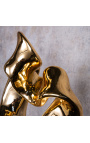 Moderne goldene Skulptur "Sakramentband"