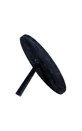 Rundt bordspeil med ekte sort og hvit okseskinn