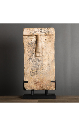 Large iconic "mute" stele in stone