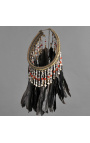 Primitive black ceremonial necklace from Indonesia