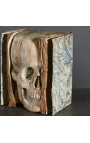 Livro "Memento Mori" com caveira esculpida