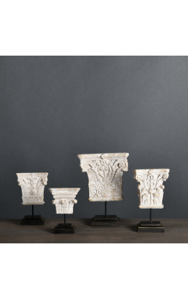Set of 4 French Empire and Restoration style capitals