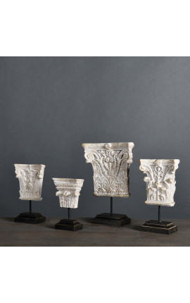 Set of 4 French Empire and Restoration style capitals