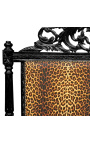 Barokkityylinen sängynpääty leopardikuvioisella kankaalla ja mustalla puulla